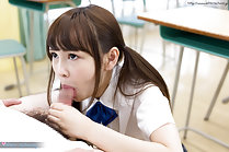 Atomi Shuri sucking cock head on her knees in classroom